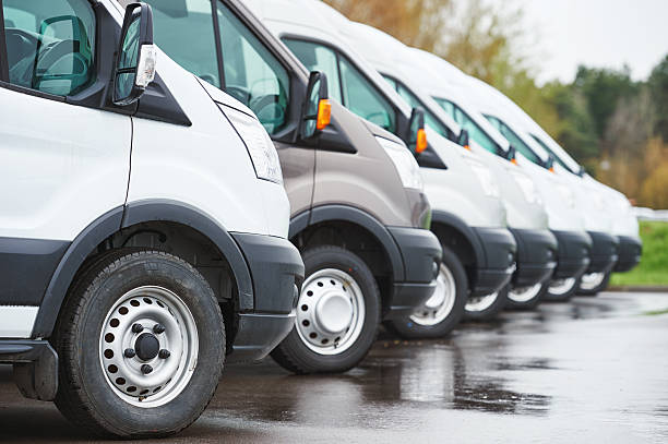 istock transporting service company. commercial delivery vans in row 526824604