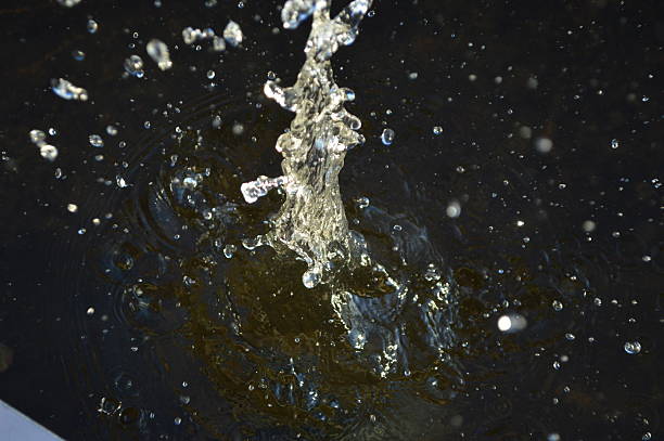 istock Splash of water on brown waters in the Ausable river 526824748
