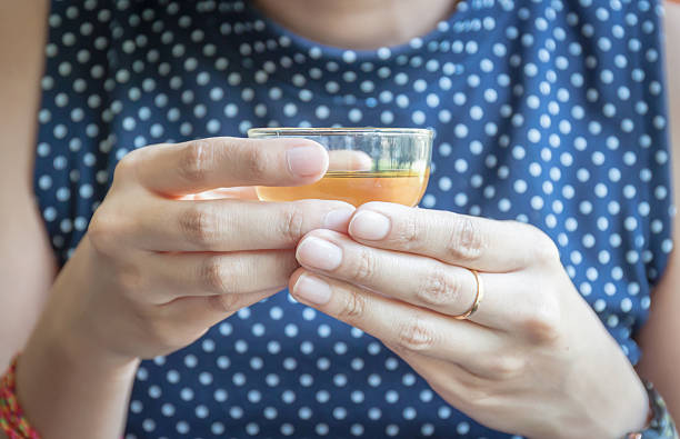 istock Asian woman enjoy drinking a hot tea 526825020