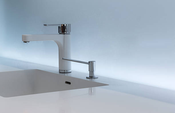 istock Closeup of water tap in bathroom interior 526825482