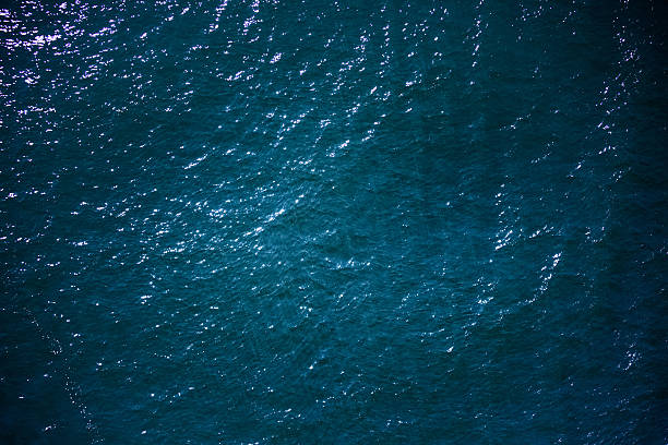 superficie del mar - sea blue lake fotografías e imágenes de stock