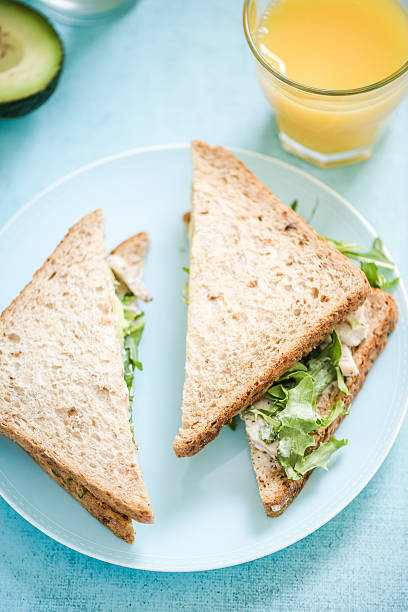 istock Chicken and avocado wholegrain bread sandwich 526829742