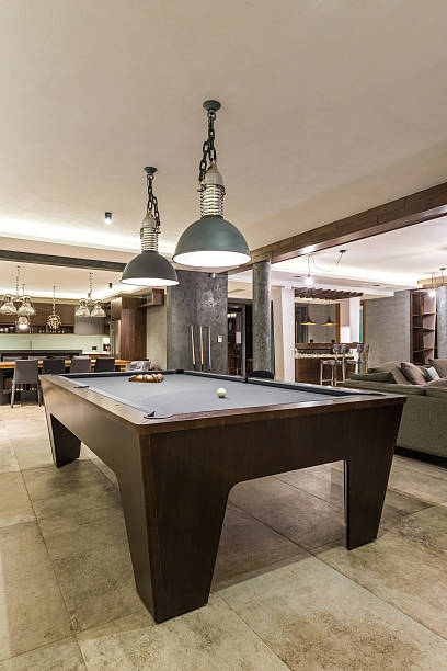 istock Interior of a luxury living room with billiard table 526831240