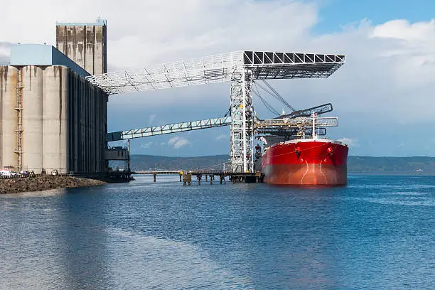 Bulk grain carrier ship at terminal in Tacoma, WA