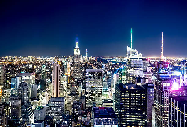 horizonte de nova iorque na noite - new york state skyline new york city vibrant color - fotografias e filmes do acervo