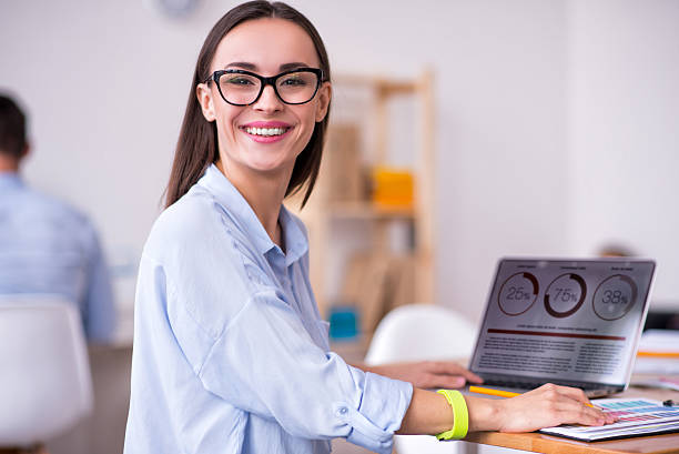 istock Pleasant woman sitting at the table 526832980