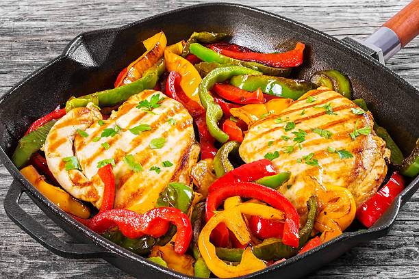 istock Grilled Chicken breast fillet and fried bell pepper 526833164