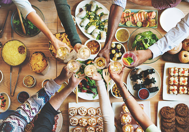 istock Friends Happiness Enjoying Dinning Eating Concept 526833168
