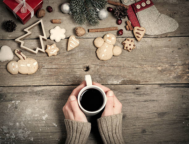istock Christmas decorations, home made ginger bread and woman's hand o 526833481