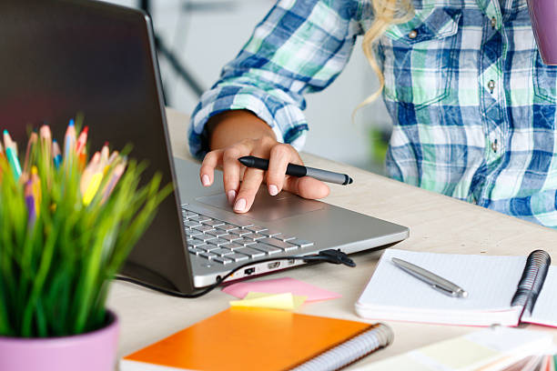 istock Hands of female designer in office 526833892