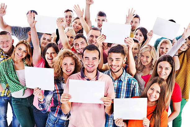 istock Group of cheerful people holding white papers. 526834297