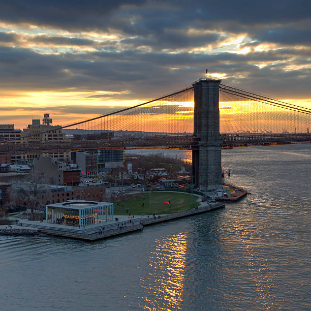 istock Sunset behind the Brooklyn Bridge in NYC 526834490
