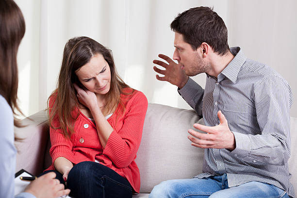 istock Screaming husband and wife during psychotherapy 526835689