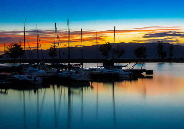 Marina Sunset This is a fall sunset at a marina on Utah Lake in Provo, UT. lake utah stock pictures, royalty-free photos & images