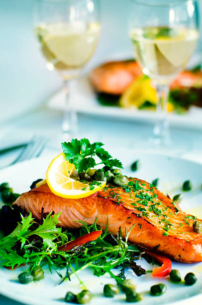 istock Grilled Salmon Fillet Vegetables Glass White Wine Concept 526835954