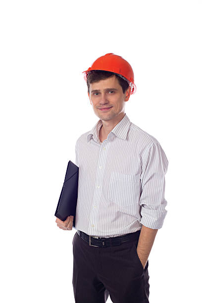istock man in shirt orange construction helmet with black folder 526836569