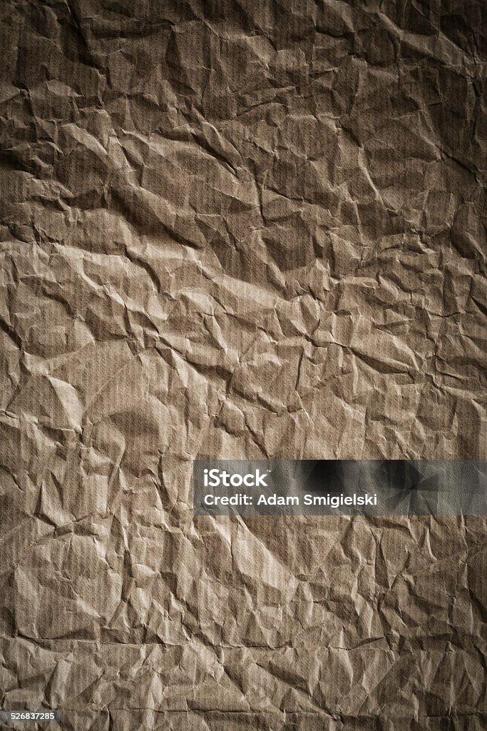 crumpled paper brown crumpled paper sheet background texture Backgrounds Stock Photo