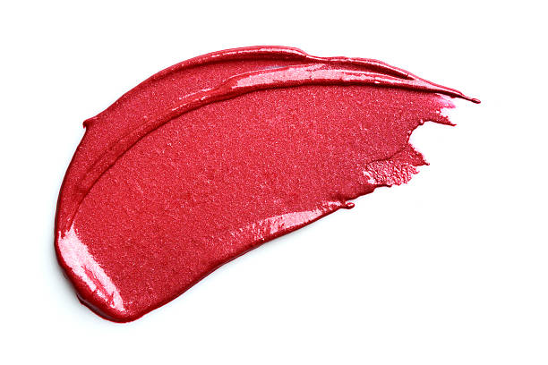 smeared rouge à lèvres rouge - crushed make up cosmetics lipstick photos et images de collection