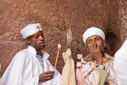 Lalibela, Ethiopia - January 6th, 2014: Unidentified Orthodox priests wait beginning of the Orthodox Christmas Night on January 6, 2014 in Lalibela, Ethiopia.