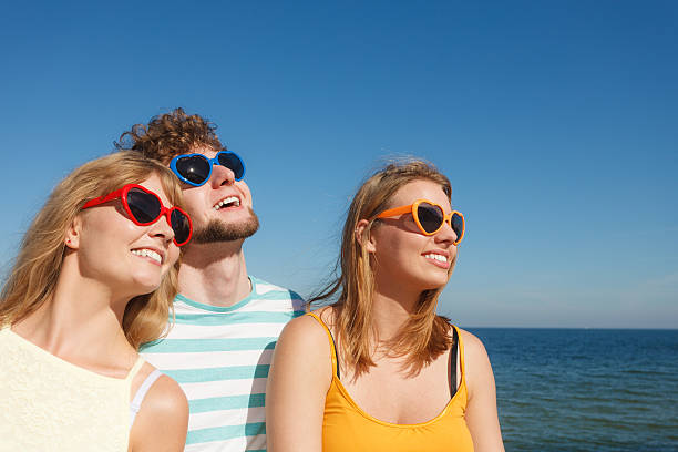 istock Group friends boy two girls having fun outdoor 526838092