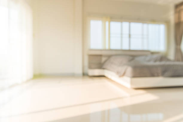 istock blur of light shines through white curtains in room 526838872
