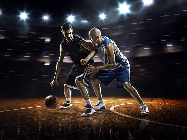 istock Two basketball players in action 526839451