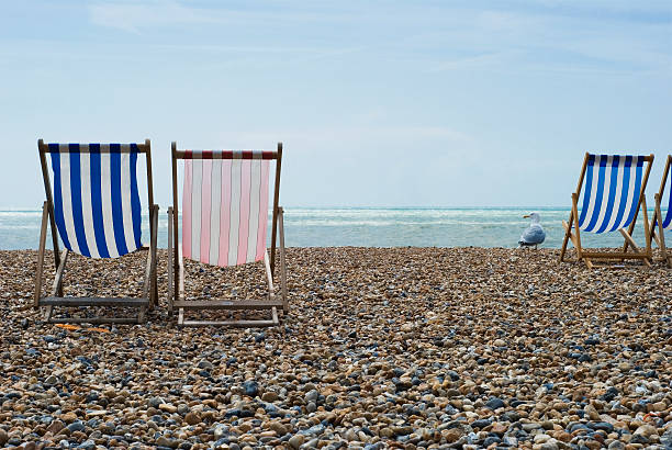 istock Chair at rock beach 526839735