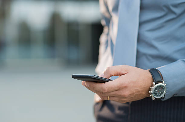 istock Businessman Holding Smartphone 526839753