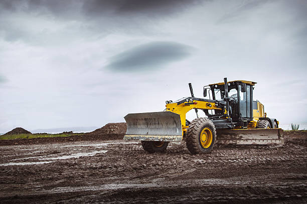 istock Road grader - heavy earth moving left dirty 526843054