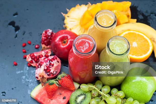 Juices Smoothie Red Green Orange Tropical Fruit Stock Photo - Download Image Now - Amino Acid, Apple - Fruit, Banana