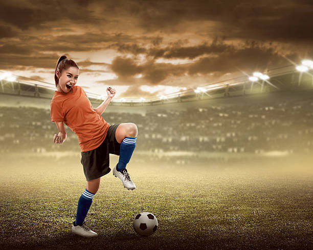 istock Happy woman soccer player 526846246