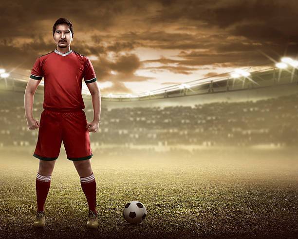 istock Asian football player standing 526846312
