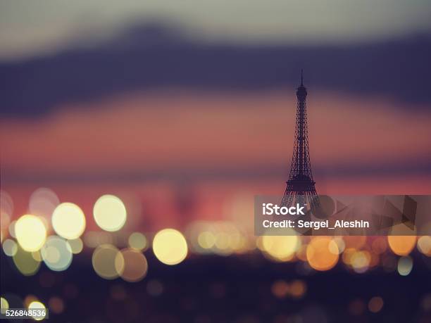 Silhouette Of Eiffel Tower And Night Lights Of Paris France Stock Photo - Download Image Now