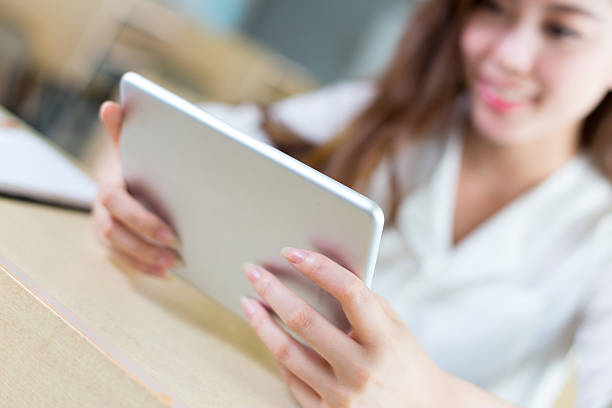 istock young beautiful asian girl student in classroom 526850412