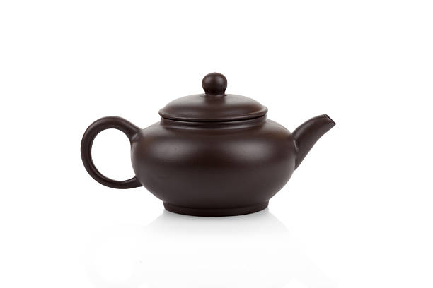 istock Traditional asian clay teapot isolated 526853589