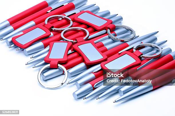 Silverred Metal Pens And Keychains Isolated On White Stock Photo - Download Image Now