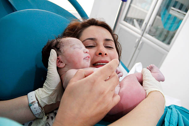 istock Newborn and Mother in hospital 526856661