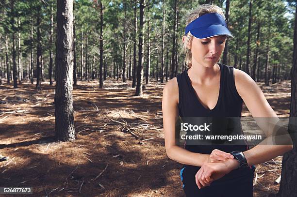 Stopwatch Trail Runner Stock Photo - Download Image Now - Activity, Adult, Adults Only