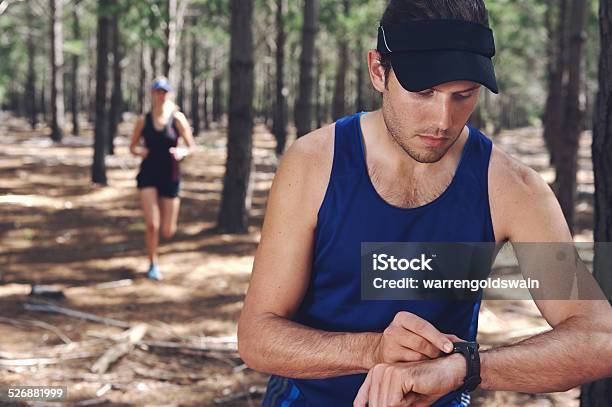 Sports Watch Couple Stock Photo - Download Image Now - Activity, Adult, Athlete