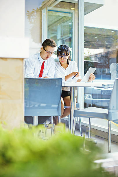 istock Man and woman working together 526883641