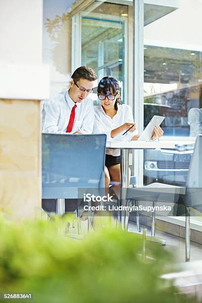 Man And Woman Working Together Stock Photo - Download Image Now - Large, Office, Teamwork