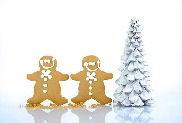 Happy Christmas gingerbread men cookies with tree