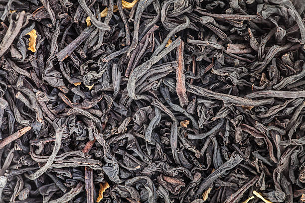 istock Extreme Closeup of Tea Leaves 526884011