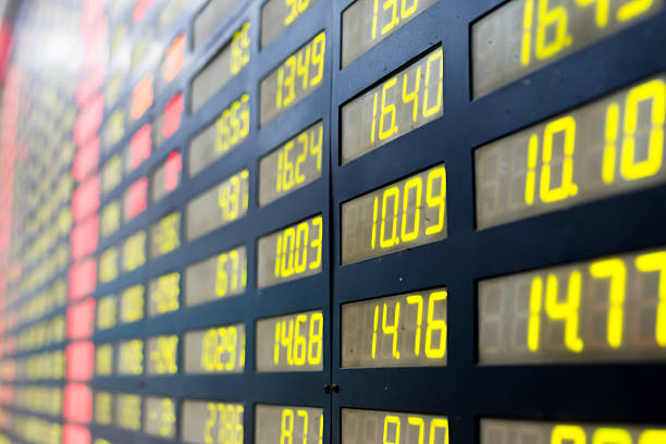istock stock or currency exchange market displau screen board 526884219