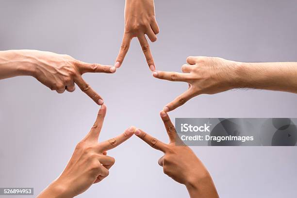 Forming Star Shape Stock Photo - Download Image Now - Star Shape, Making, Human Hand
