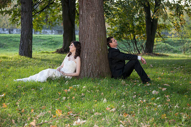 istock Elegant bride and groom posing together outdoors 526896283