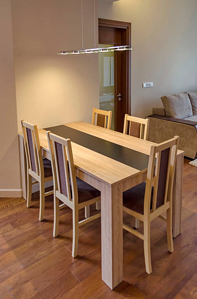 istock Dining-table in living room - renovated apartment 526896787