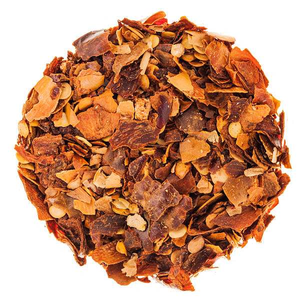 Circle of Chilli Peppers Flakes Isolated on White Background