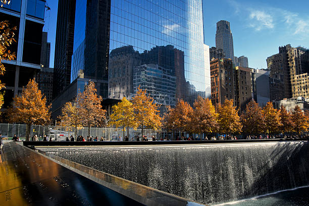 national september 11 memorial und herbst farben, new york city - editorial in a row national landmark famous place stock-fotos und bilder