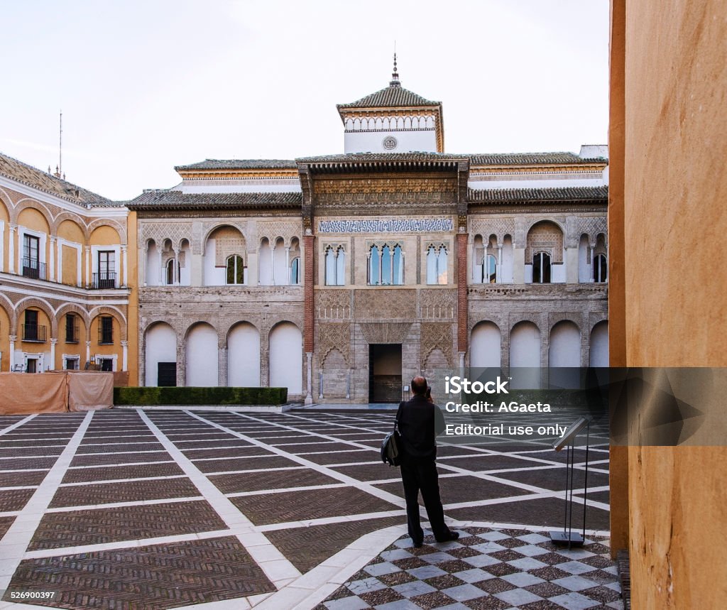 Seville, Spain, Alcazar Seville, Spain. November 15, 2014. A tourist takes a picture of the royal palace Alcazar of Seville, a magnificent and striking building built by the Arabs in the tenth century. Alcazar Palace Stock Photo